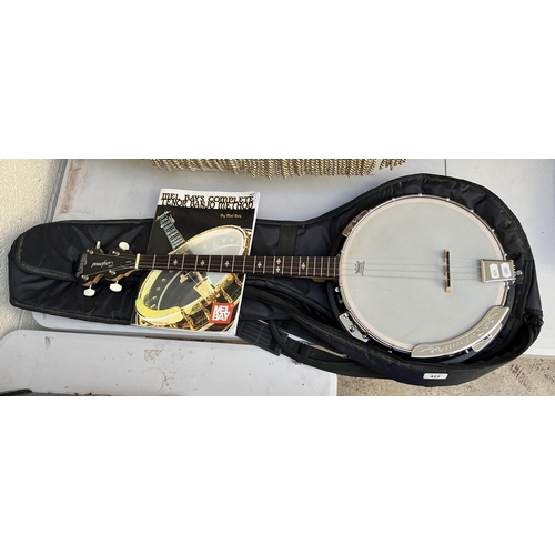 422 - Union series banjo by Tanglewood together with music book