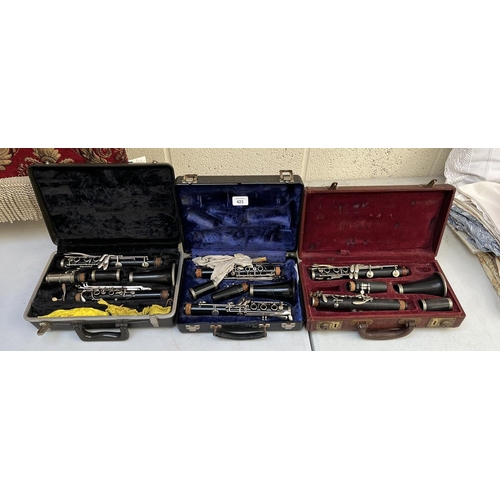 423 - 3 clarinets in original cases