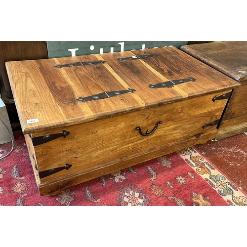 437 - Sheesham wood chest with forged steel fixtures and 2 hinged top openings.