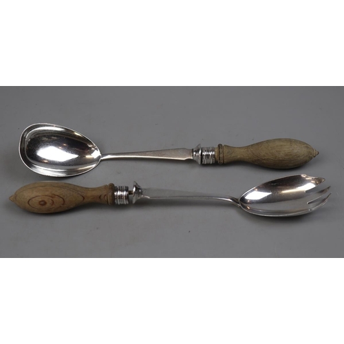 5 - Silver salad servers with wooden handles