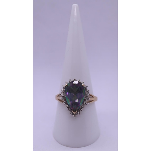 56 - 9ct gold mystic topaz & diamond set ring - Size R