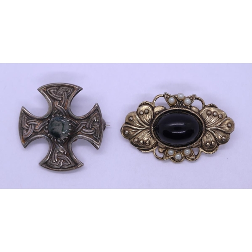 63 - Silver Celtic brooch together with a yellow metal brooch