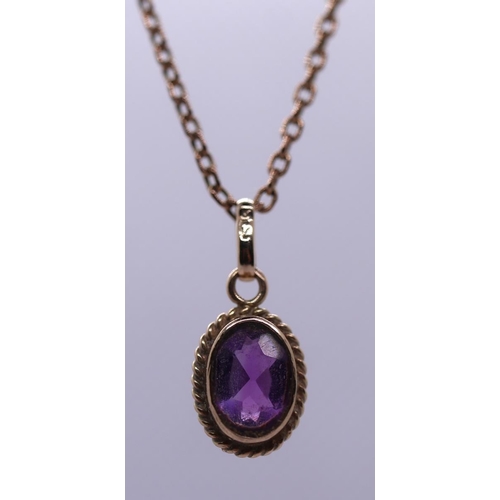 66 - 9ct gold stone set pendant on 9ct gold chain