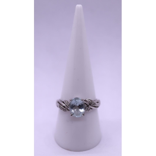 75 - 9ct white gold diamond and stone set ring - Size R