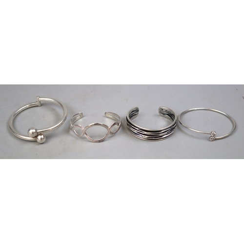 94 - 4 silver bangles