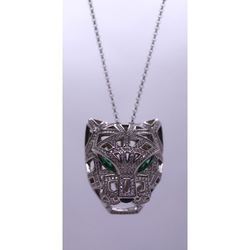 12 - Silver stone set leopards head pendent on chain