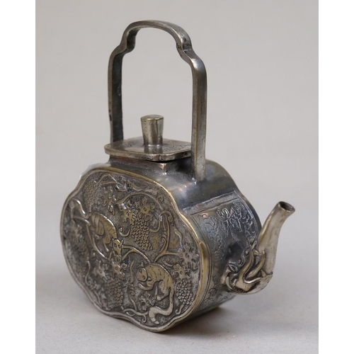 129 - Chinese animal engraved white metal and brass teapot