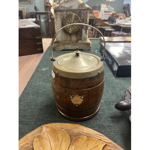 215 - 2 decorative leaf trays together with a biscuit barrel