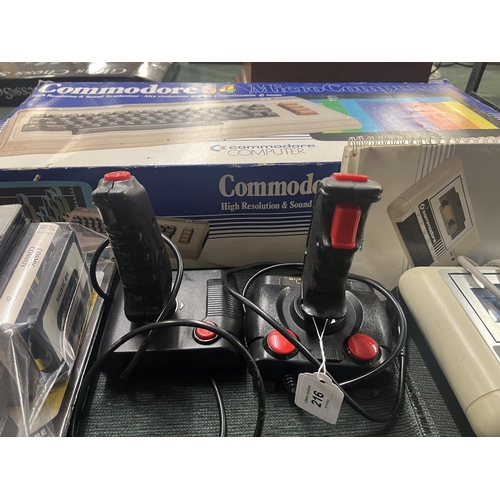 216 - Commadore 64 Micro Computer in original box together with games, controllers etc