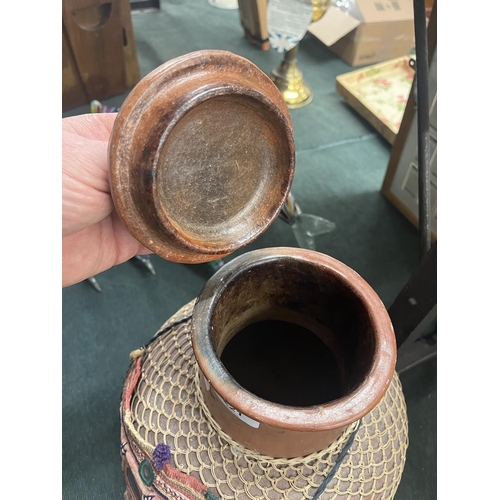 221 - Lidded terracotta pot with cane wrap together with a Jordanian woman's mask