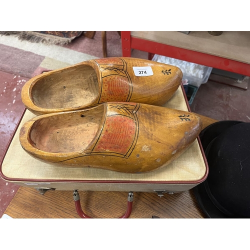 274 - Collection of riding hats and other plus vintage suitcase with 2 pairs wooden clogs