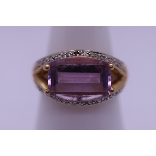 30 - 9ct gold amethyst & diamond set ring - Size O