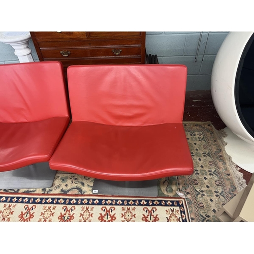 324 - A pair of Peter Maly for Tonon Italia wave chairs