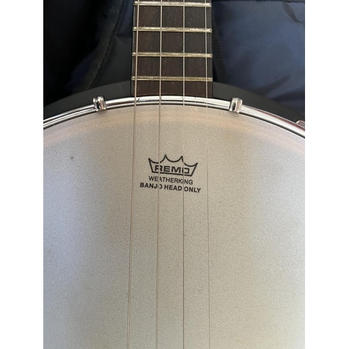 422 - Union series banjo by Tanglewood together with music book