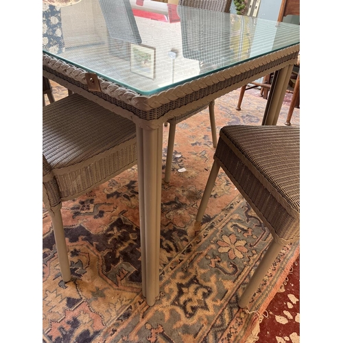 435 - Lloyd Loom glass topped table with 5 chairs - Approx L: 180cm W: 90cm H: 76cm