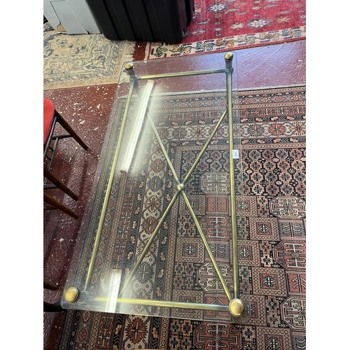 443 - Glass topped brass framed coffee table