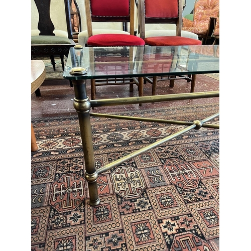 443 - Glass topped brass framed coffee table