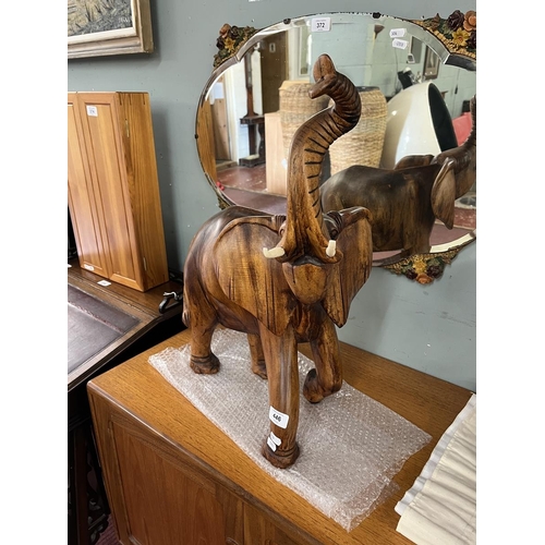 446 - Large heavy wooden elephant - Approx H: 56cm