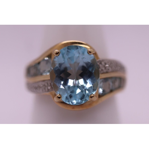 83 - 9ct gold diamond and stone set ring - Weight: 6.3g - Size R