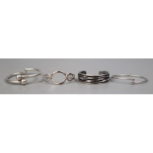 94 - 4 silver bangles