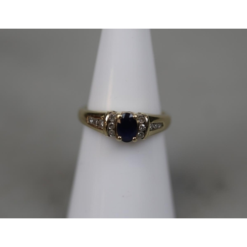 114 - 9ct gold sapphire and diamond set ring 2.7g - Size L