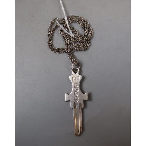 116 - Silver key on chain