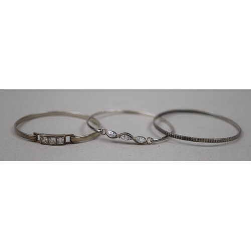 128 - 3 silver bangles