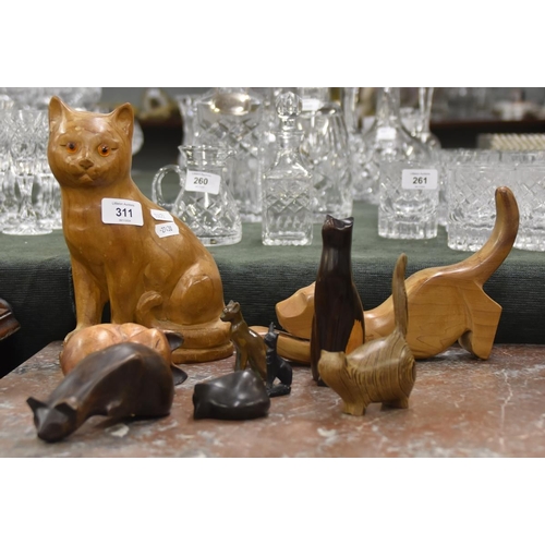 311 - Collection of carved wooden cat figures to include John Fox