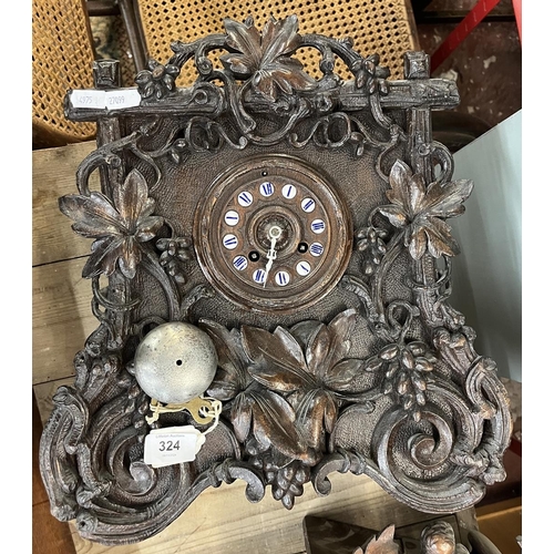 324 - Carved mantle clock with French movement