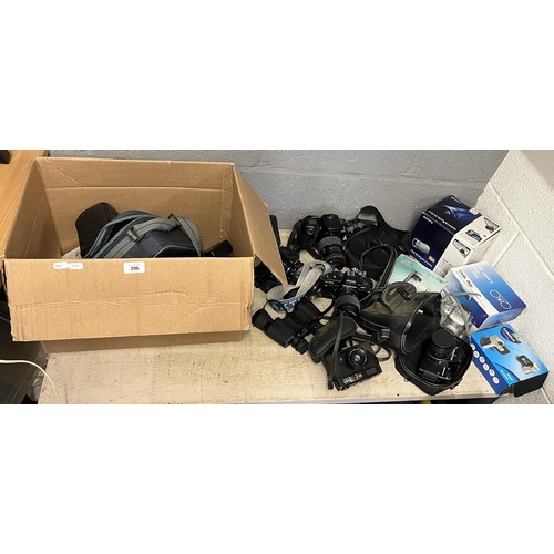 396 - Large collection of camera equipment to include binoculars