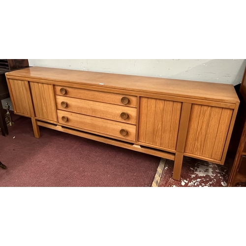 414 - Mid century teak sideboard by Greaves and Thomas - Approx W: 220cm D: 43cm H: 76cm