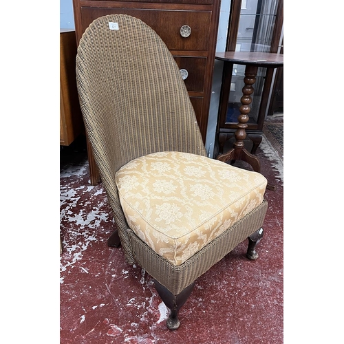 421 - Lloyd Loom nursing chair