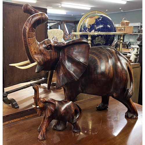 428 - Large heavy wooden elephant mother & calf - Approx H: 55cm