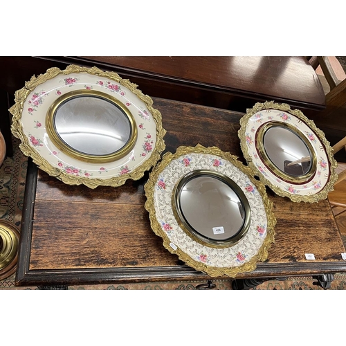 450 - Set of 3 ornate flower themed porcelain and gilt framed mirrors