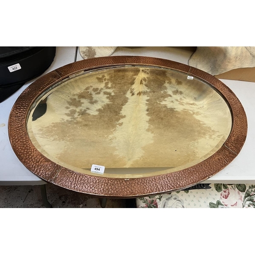 494 - Copper Arts & Crafts bevelled glass mirror