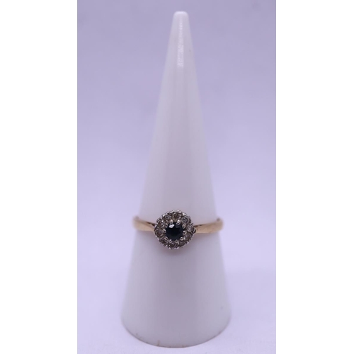 64 - 9ct gold diamond & sapphire set ring - Size P