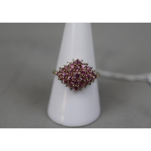 98 - 9ct gold pink stone set cluster ring - Size R