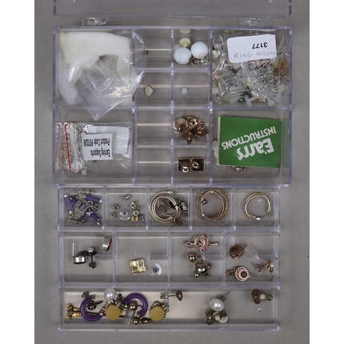 132 - Collection of costume jewellery in acrylic drawers to include silver