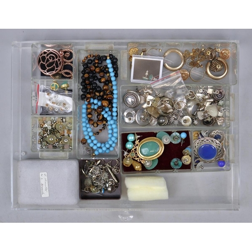 138 - Collection of costume jewelley in acrylic drawers to include silver