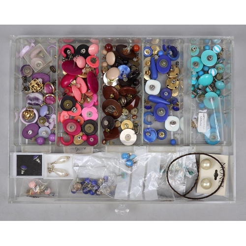 138 - Collection of costume jewelley in acrylic drawers to include silver