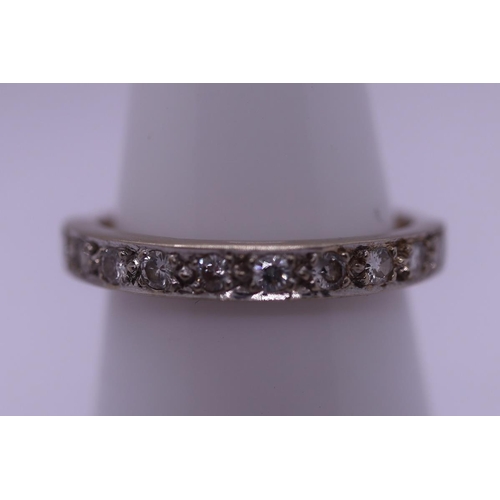 17 - 18ct gold 11 stone diamond set half hoop ring - Size M