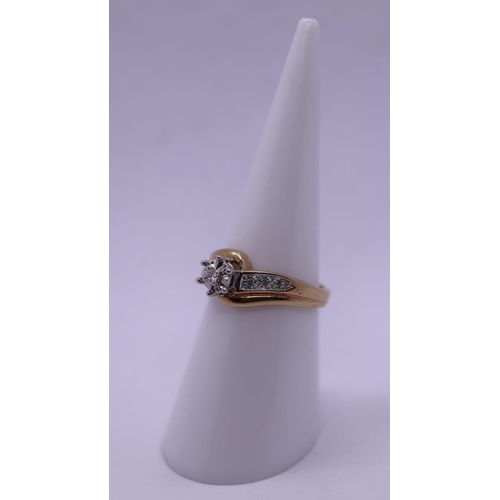 24 - 9ct gold diamond solitaire ring with diamond shoulders - Size K