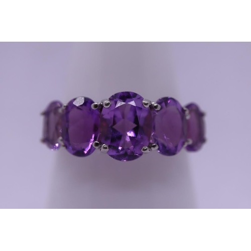 25 - Silver and amethyst set ring - Size M