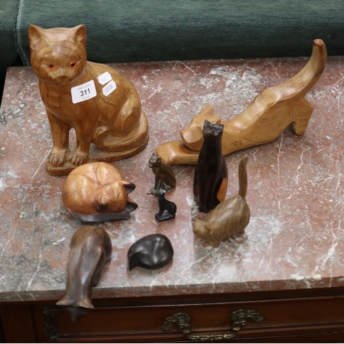 311 - Collection of carved wooden cat figures to include John Fox