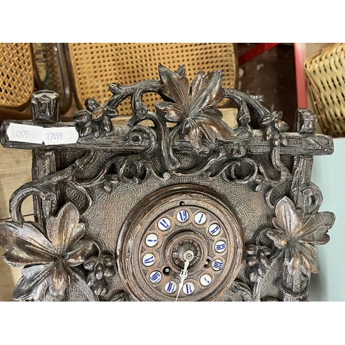 324 - Carved mantle clock with French movement