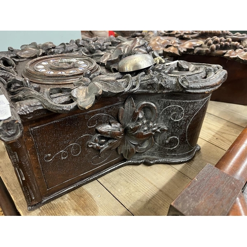 324 - Carved mantle clock with French movement