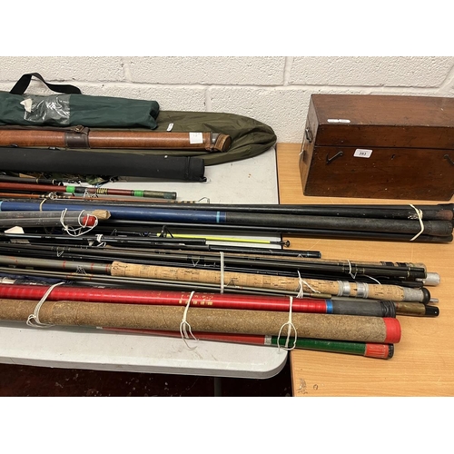 392 - Good collection of fishing rods and equipment to include match rods, landing nets and tents etc