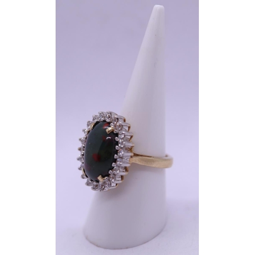 41 - 9ct gold ring set with bloodstone and white sapphire oval cluster - Gross weight 9.3g - Size N