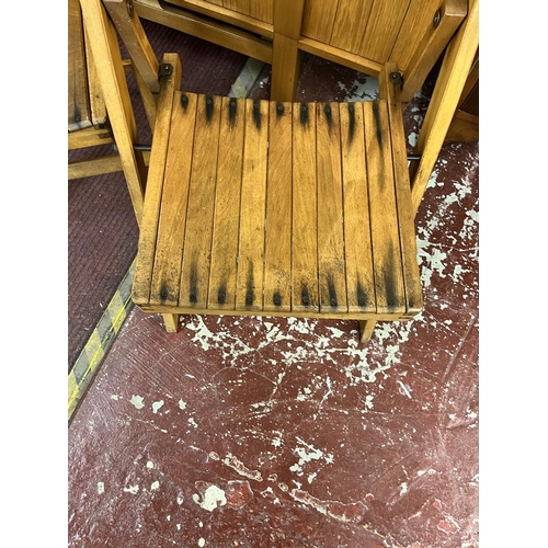 419 - 2 folding teak chairs