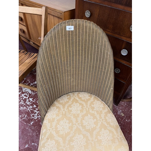 421 - Lloyd Loom nursing chair